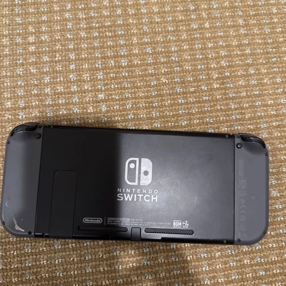 Nintendo Switch Console with Black and Red Accessories